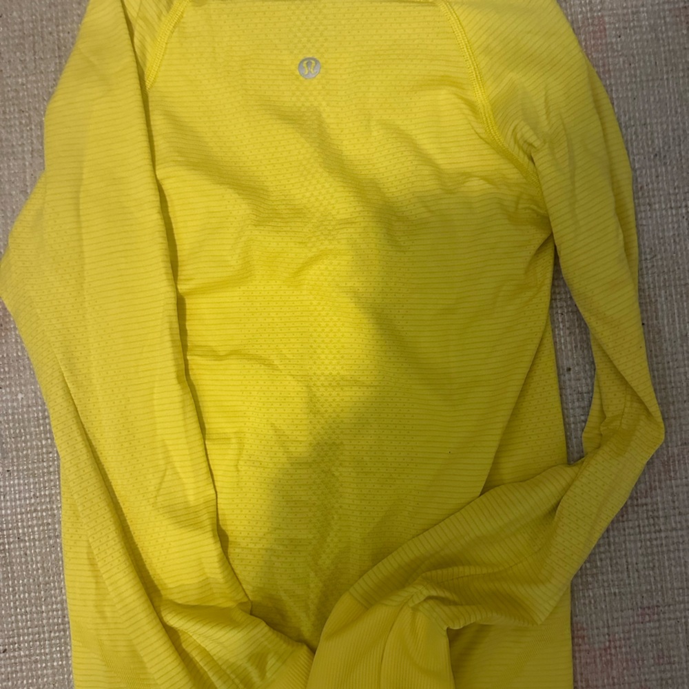 Lululemon  size 2 long sleeved top!  Canary yellow - rare!